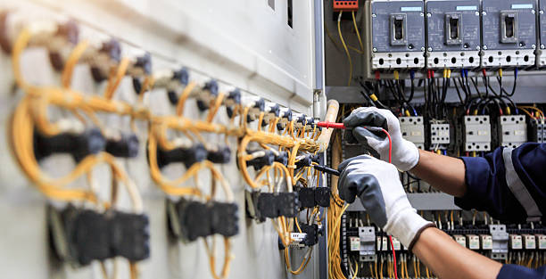 Professional Electrician technician working in Hybla Valley, VA